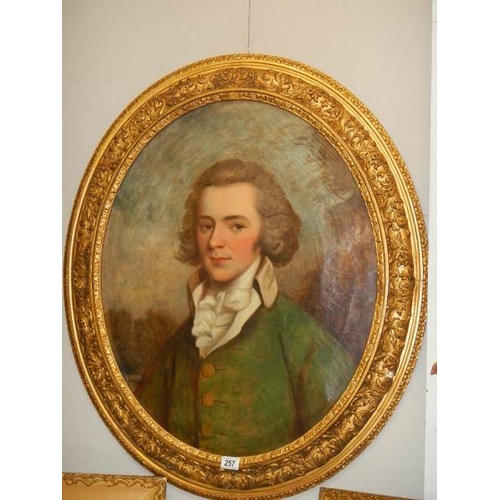 257 - A gilt framed oval oil portrait of a gentleman, circa late 18th / early 19th century. Perported to h... 