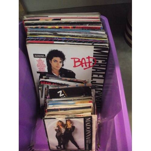 307 - A mixed lot of LP and 45 rpm records including Michael Jackson, Madonna etc.,