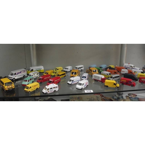 319 - A box of die cast construction themed model vehicles.