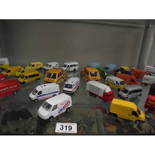 319 - A box of die cast construction themed model vehicles.