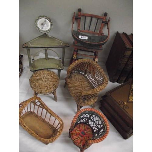 322 - A quantity of vintage wicker and wood doll's furniture.