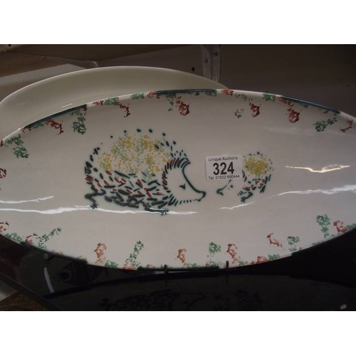 324 - 3 decorative fish plates.