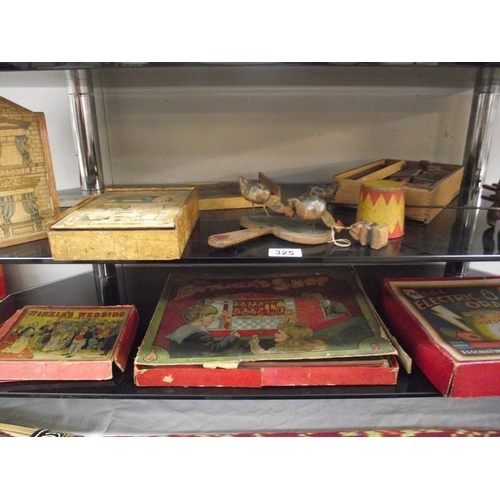 325 - 2 shelves of early - mid 20th century children's wooden games and toys.