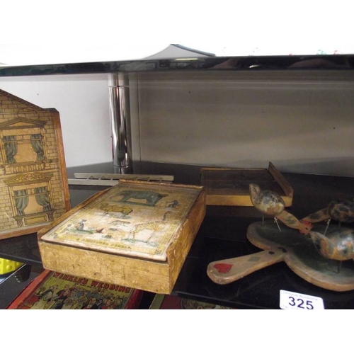 325 - 2 shelves of early - mid 20th century children's wooden games and toys.