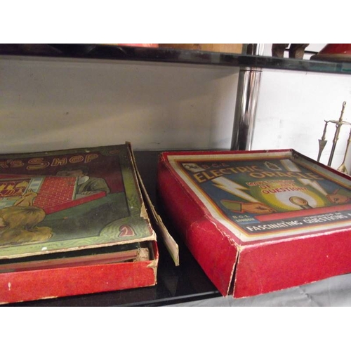 325 - 2 shelves of early - mid 20th century children's wooden games and toys.