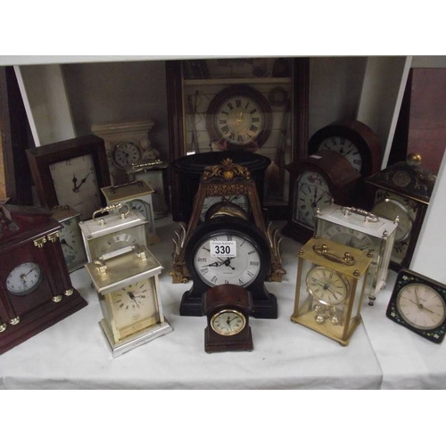 330 - A large quantity of carriage and mantle clocks.