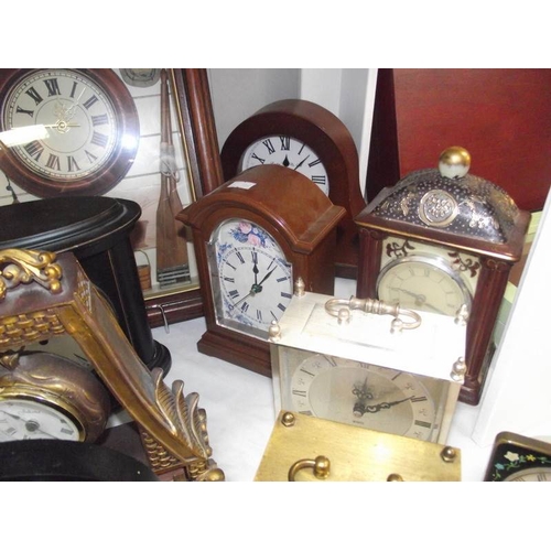 330 - A large quantity of carriage and mantle clocks.