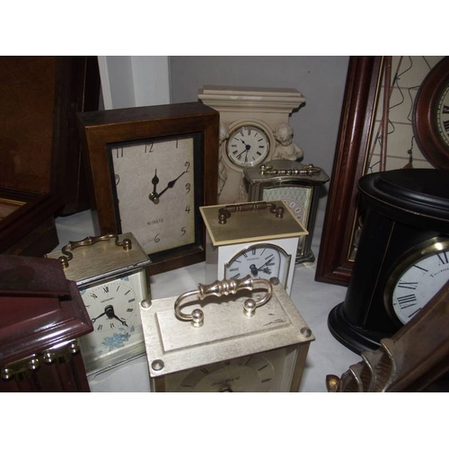 330 - A large quantity of carriage and mantle clocks.