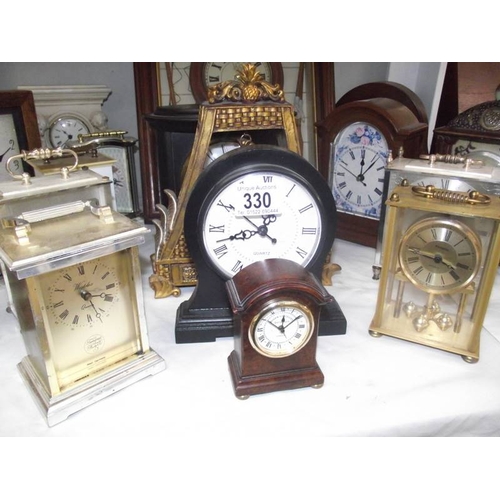 330 - A large quantity of carriage and mantle clocks.