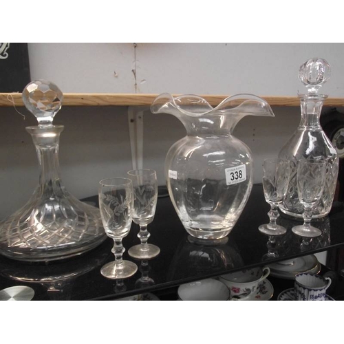 338 - 2 cut glass decanters etc.,