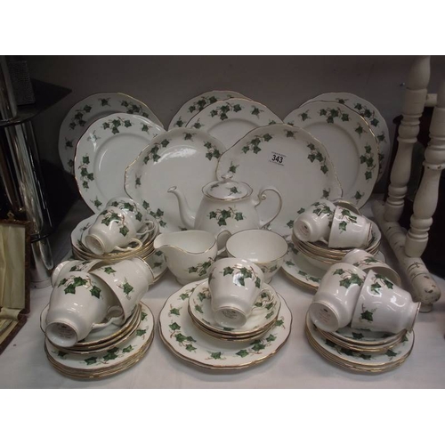 343 - In excess of 50 pieces of Colclough tea and dinner ware including teapot.