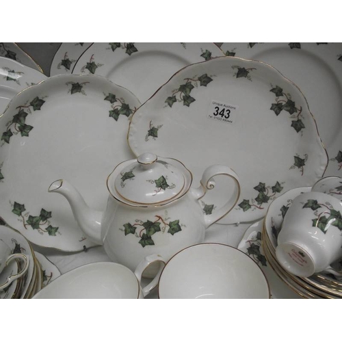 343 - In excess of 50 pieces of Colclough tea and dinner ware including teapot.