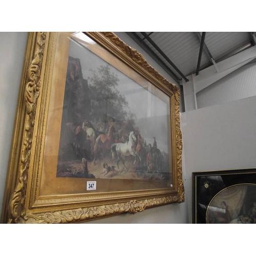 347 - A gilt framed and glazed print of horses.