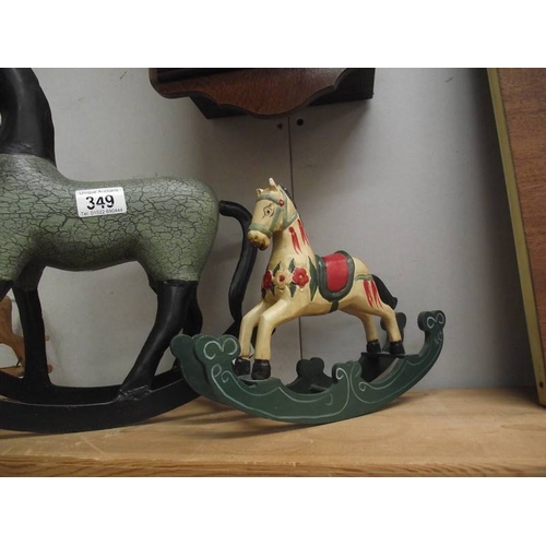 349 - 2 small wooden rocking horses, 1 ear a/f and a metal rocking horse