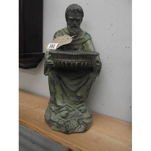 353 - A verdigree resin figure of a monk.