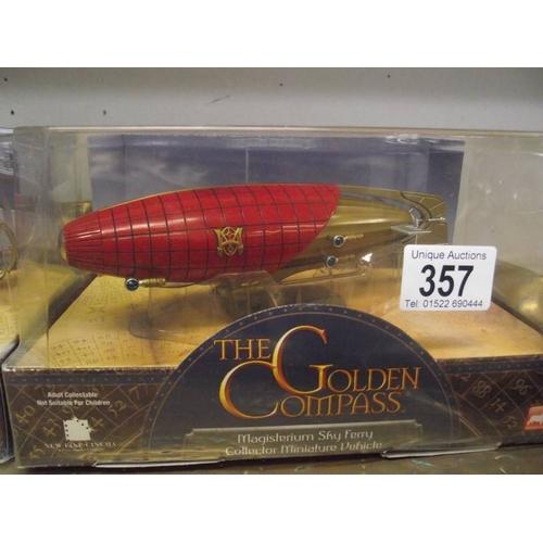 357 - 2 Corgi Golden Compass 1 airship and 1 carriage.