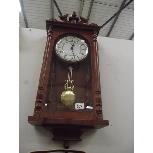 361 - An Acctim quartz Westminster chime wall clock.