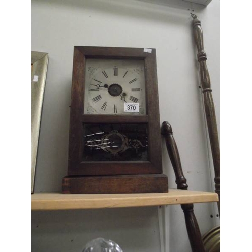 370 - An American style mantle clock,  one spring overwound.