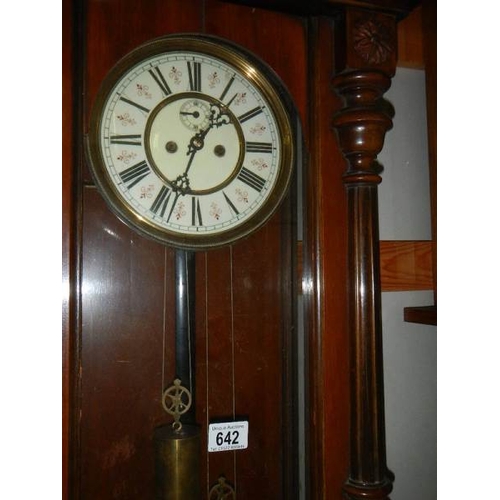 642 - A double regulator wall clock.