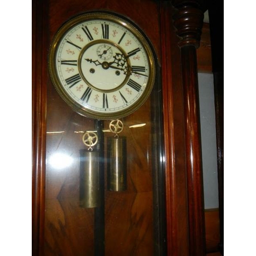 649 - A double regulator wall clock.