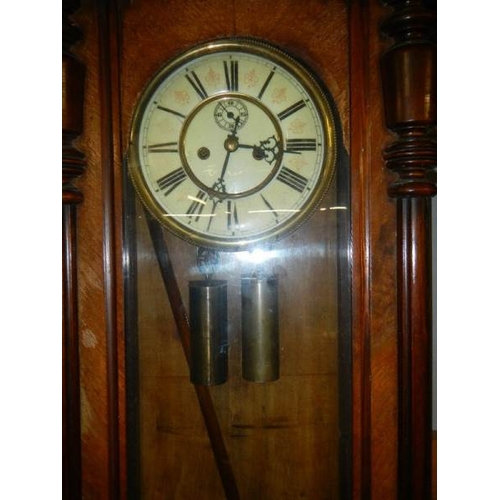 650 - A double regulator wall clock.