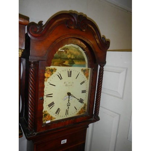 652 - A mahogany inlaid 30 hour long case clock with painted dial by Thos. Yates, Penrith.