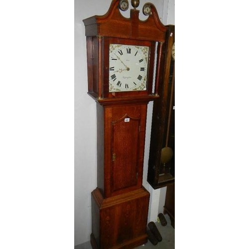 655 - An oak 30 hour long case clock, 'Aris' Uppingham.