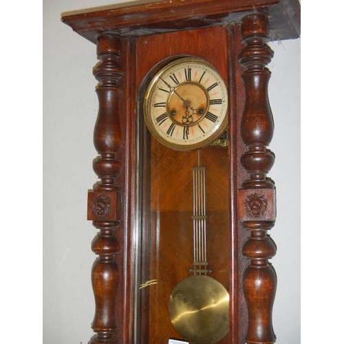 658 - A Victorian wall clock.