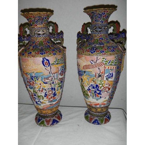 663 - A good pair of Chinese vases, no damage, 36 cm tall.