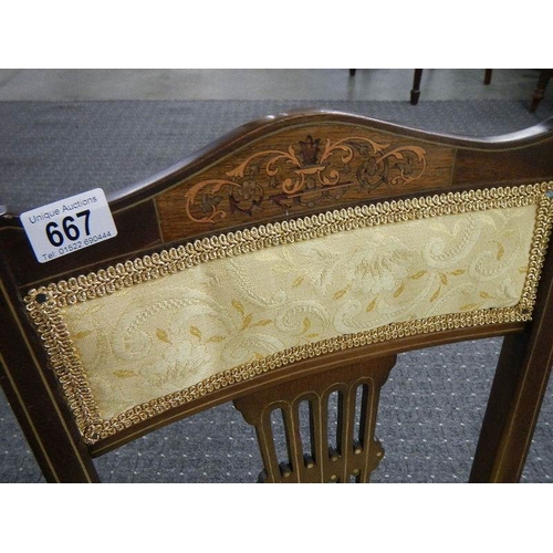 667 - An inlaid bedroom chair.