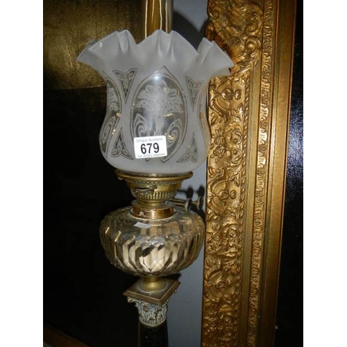 679 - A black marble Corinthian column oil lamp with cut glass font.