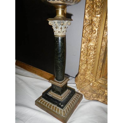 679 - A black marble Corinthian column oil lamp with cut glass font.