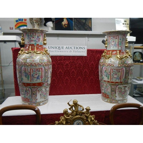 686 - A tall pair of 20th century Chinese vases, 95 cm tall.