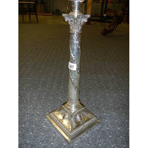 687 - A silver plated Corinthian column oil lam o with cut glass font and acid etched shade.