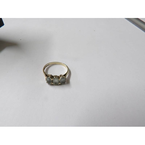 84 - A 3 stone cloudy topaz gold ring, size M.