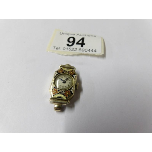 94 - A ladies 9ct gold and enamel watch head.