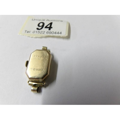 94 - A ladies 9ct gold and enamel watch head.