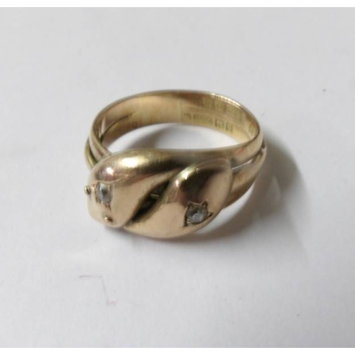 96 - A gent's gold twist ring, size S.  Approximately 7 grams.