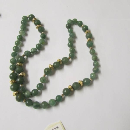 138 - 3 necklaces (possibly jade).