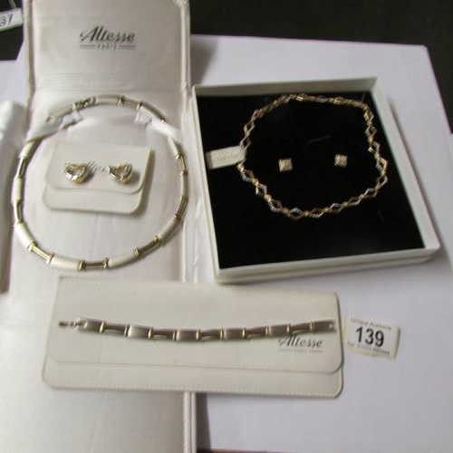 139 - An Altesse Paris necklace, bracelet and earrings together with a Nina Ricci necklace and earrings.