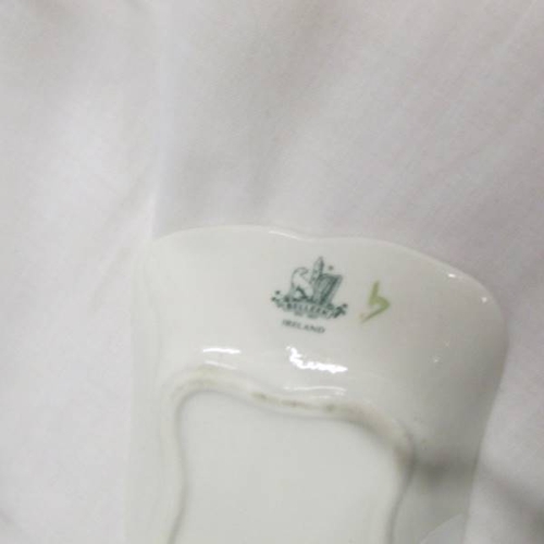 147 - A Belleek pin tray and thimble decorated with shamrocks.