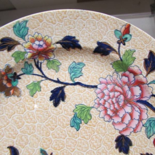 148 - A Spode hand painted plate decorated with birds.  20 cm diameter.