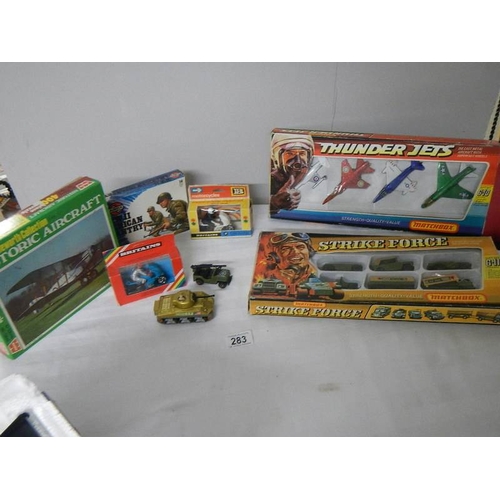 283 - Boxed Matchbox Strikeforce and Thunder Jets gift sets, Britains motorcycles etc.,