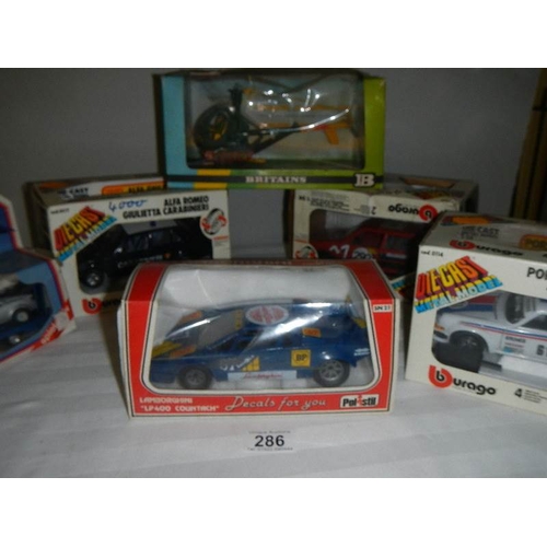 286 - A quantity of boxed die cast including Britains 9761 helicopter, Burago etc.,