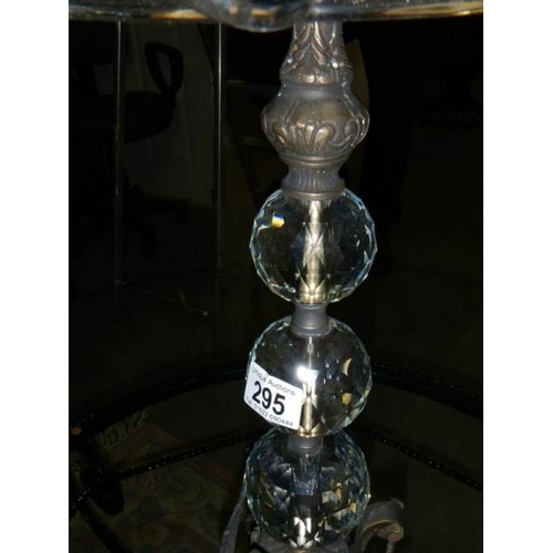 295 - A designer glass table lamp with bronze base and fittings.