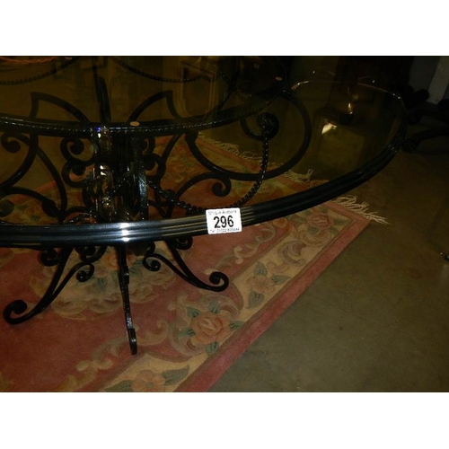 296 - A top quality designer glass top table of excellent quality.