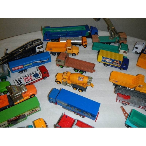 299 - In excess of 60 cars and lorries, die cast and plastic.