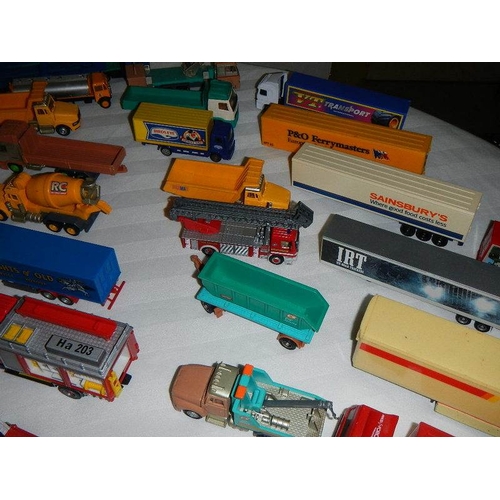 299 - In excess of 60 cars and lorries, die cast and plastic.