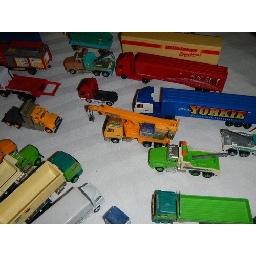 299 - In excess of 60 cars and lorries, die cast and plastic.