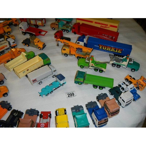 299 - In excess of 60 cars and lorries, die cast and plastic.